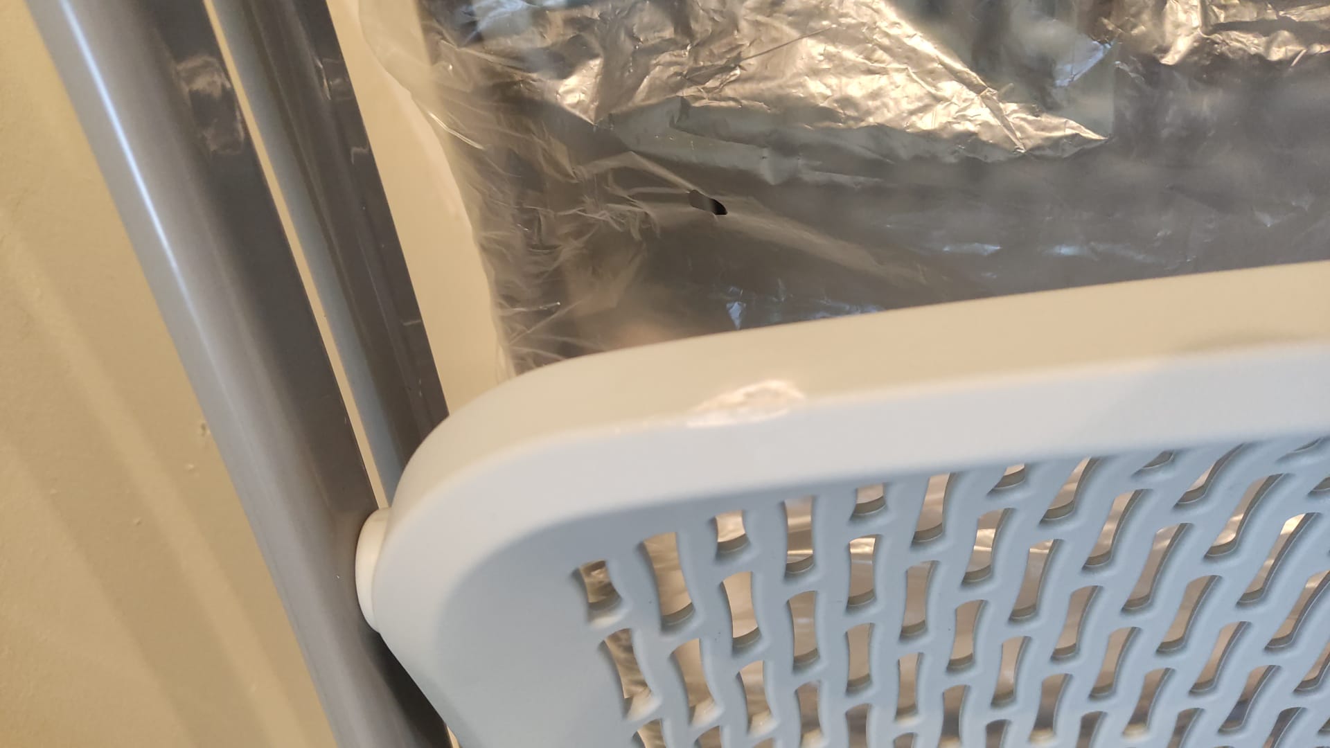 grey folding chairs with slight defect on plastic - The Jerusalem Market