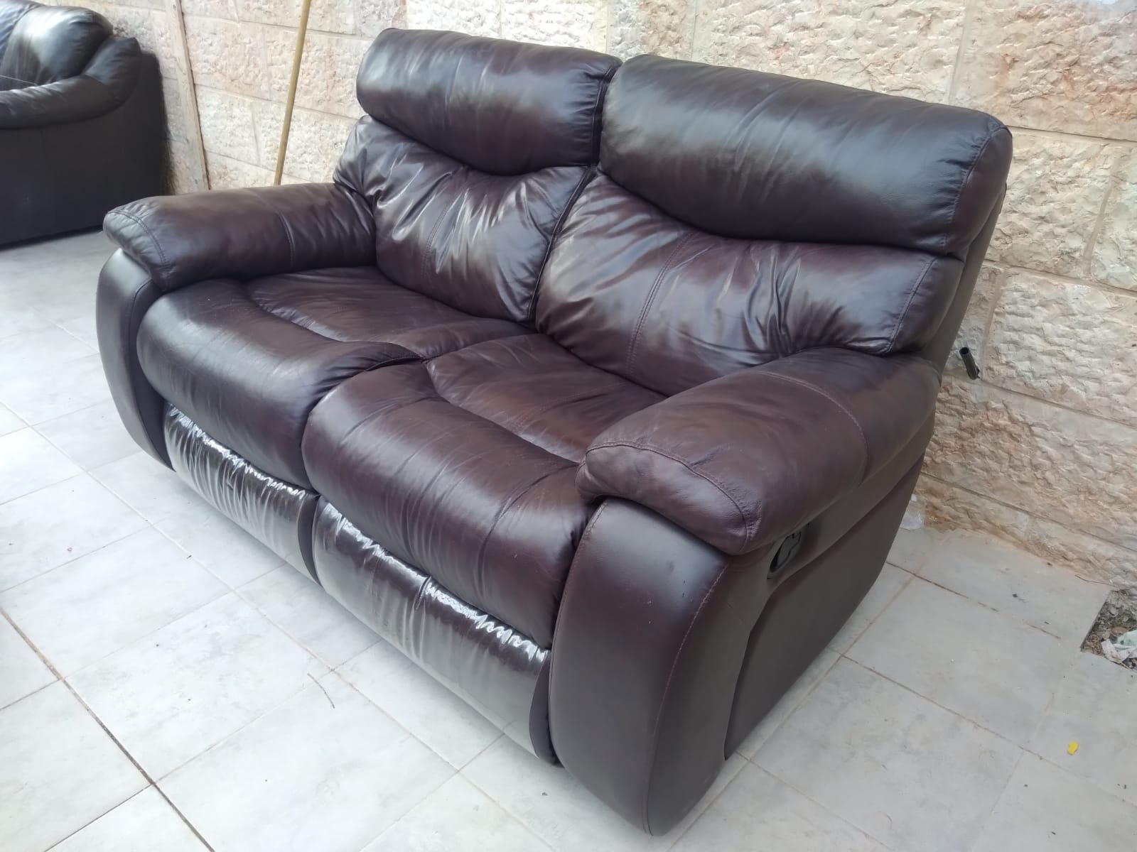 Italian Leather rocking recliner sofa, rocks and reclines