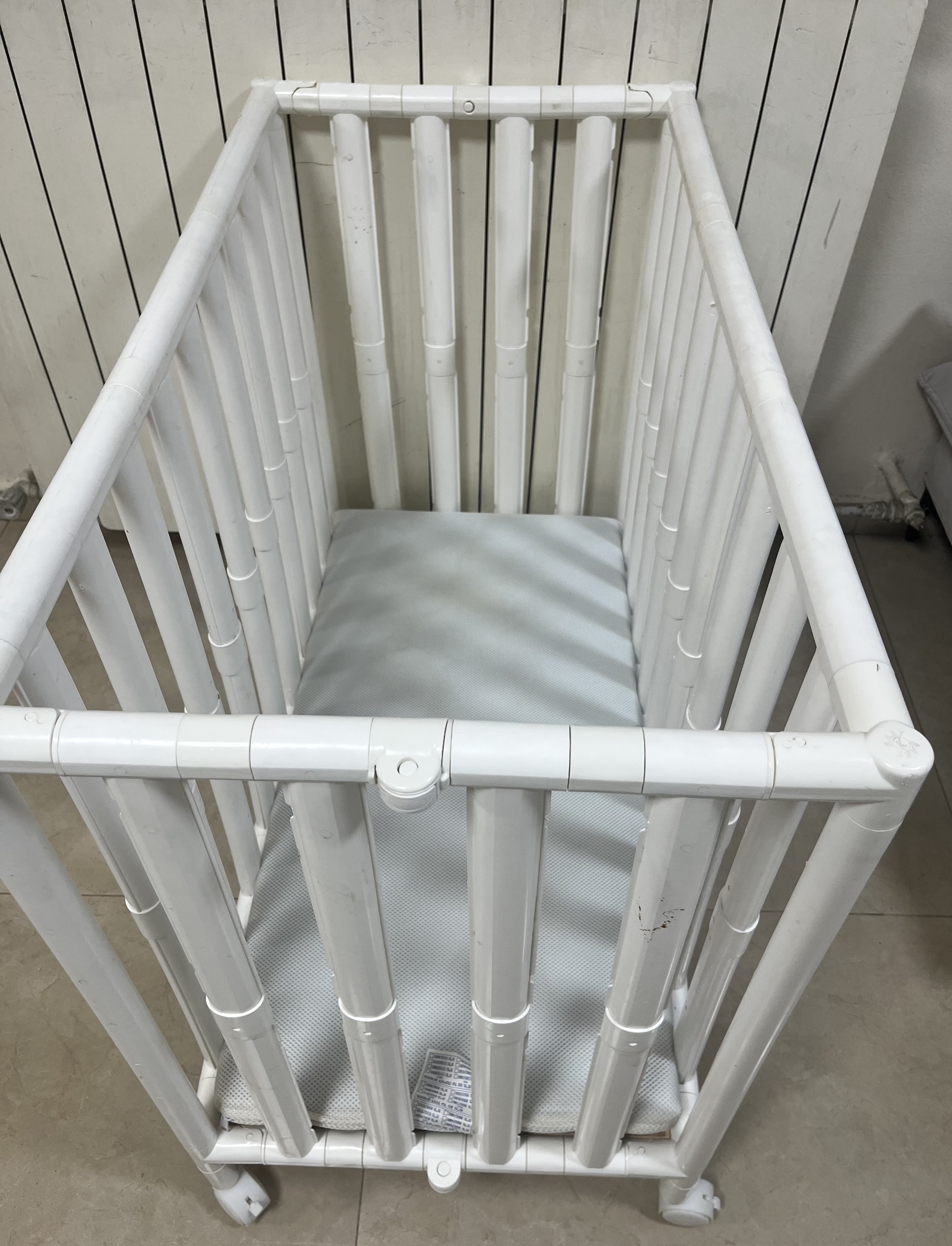 Plastic folding crib extra narrow size