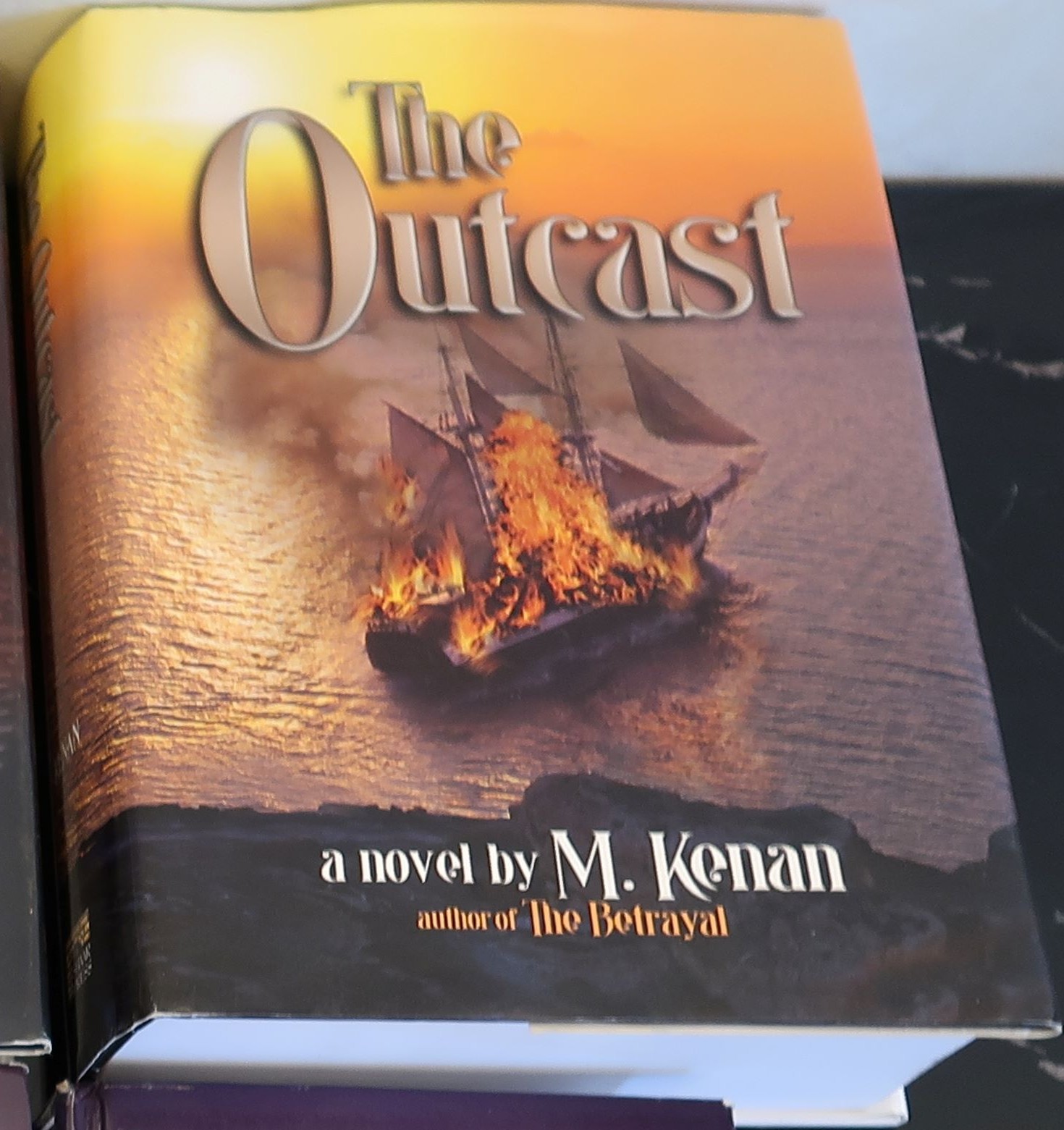Novel - The Outcast by M. Kenan