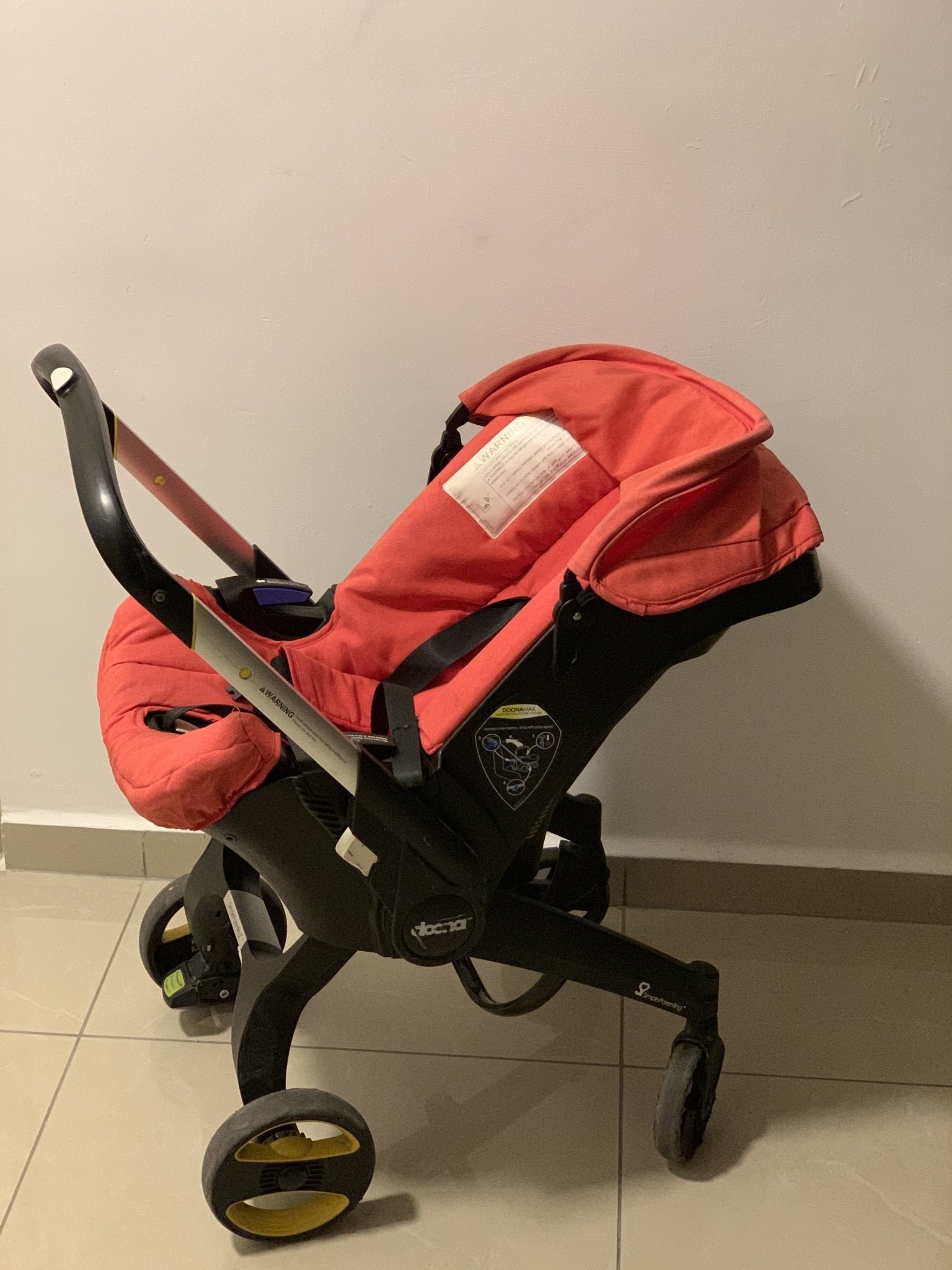 Infant car seat and stroller combo - DOONA - The Jerusalem Market